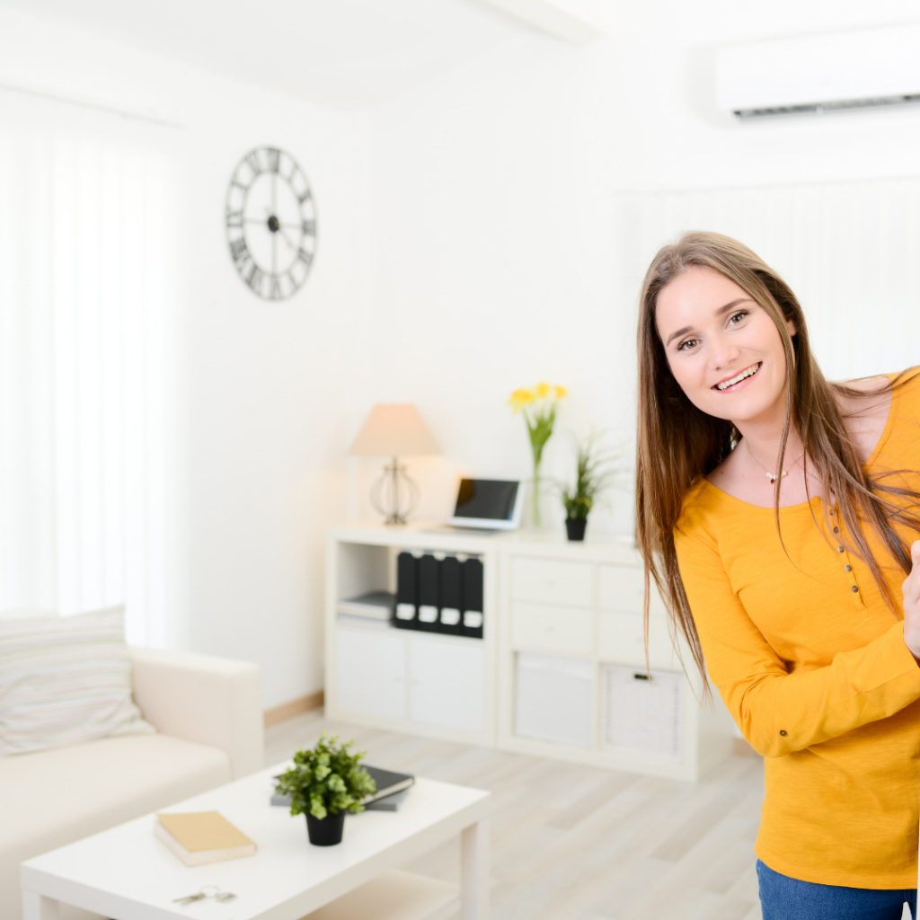 Woman greeting guests into their home