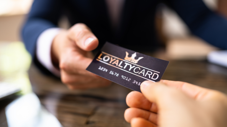 man showing his loyality card