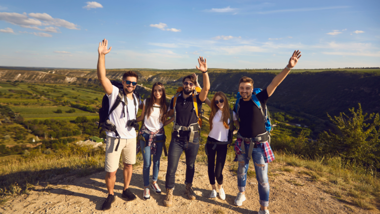 Group of friends on top of a hill